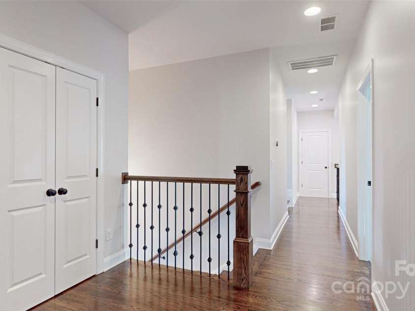 819 Beauhaven Lane, Waxhaw, NC 28173.  MLS# CAR4242522, YatesRealty ID 5915. Hardwoods Continue Up Staircase & Hallway