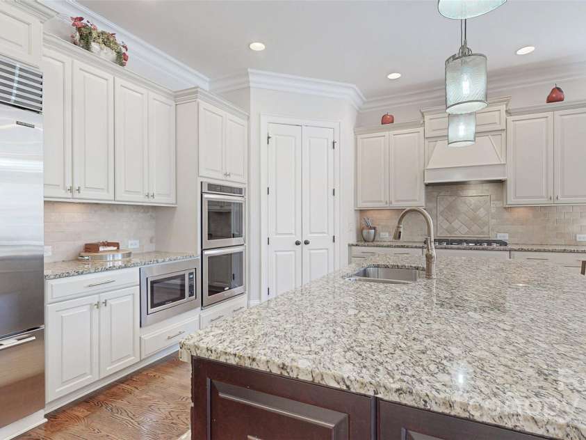 819 Beauhaven Lane, Waxhaw, NC 28173.  MLS# CAR4242522, YatesRealty ID 5915. Large Walk-In Pantry w/Wood Shelving