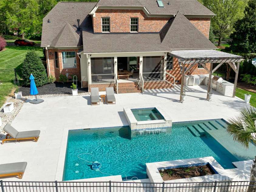819 Beauhaven Lane, Waxhaw, NC 28173.  MLS# CAR4242522, YatesRealty ID 5915. Pool w/Sun Ledge for Chairs & Umbrella in Water