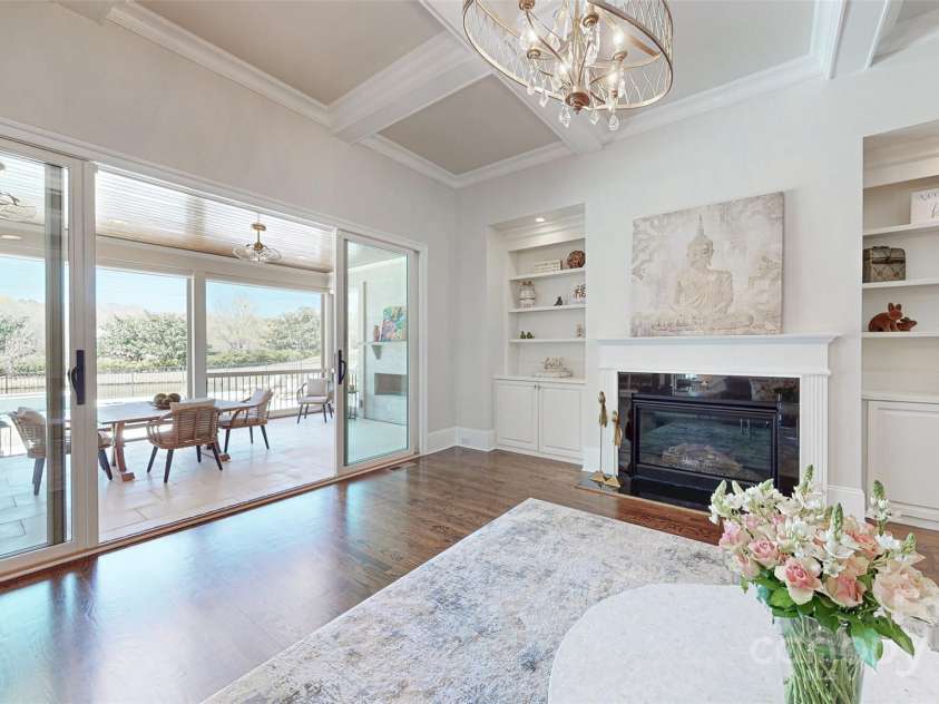 819 Beauhaven Lane, Waxhaw, NC 28173.  MLS# CAR4242522, YatesRealty ID 5915. Sliding Doors to Veranda & Built-Ins Flanking the Fireplace