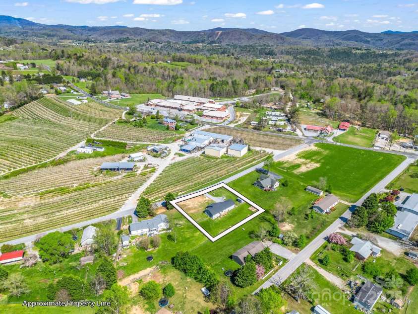 121 Blue House Road, Hendersonville, NC 28792.  MLS# CAR4242874, YatesRealty ID 5918. Mountains in the distance