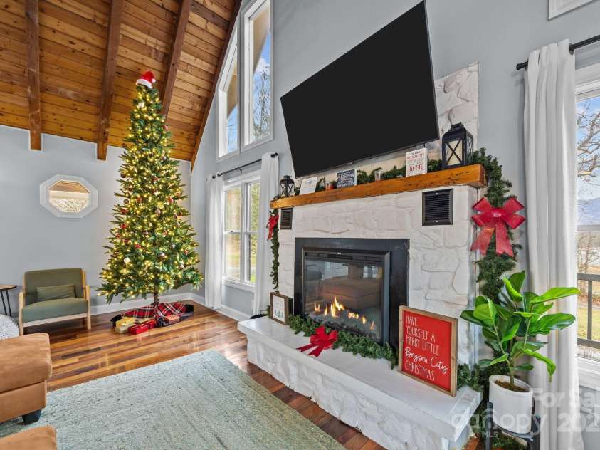 540 Toot Hollow Road, Bryson City, NC 28713.  MLS# CAR4324670, YatesRealty ID 5921. Warm cozy fireplace