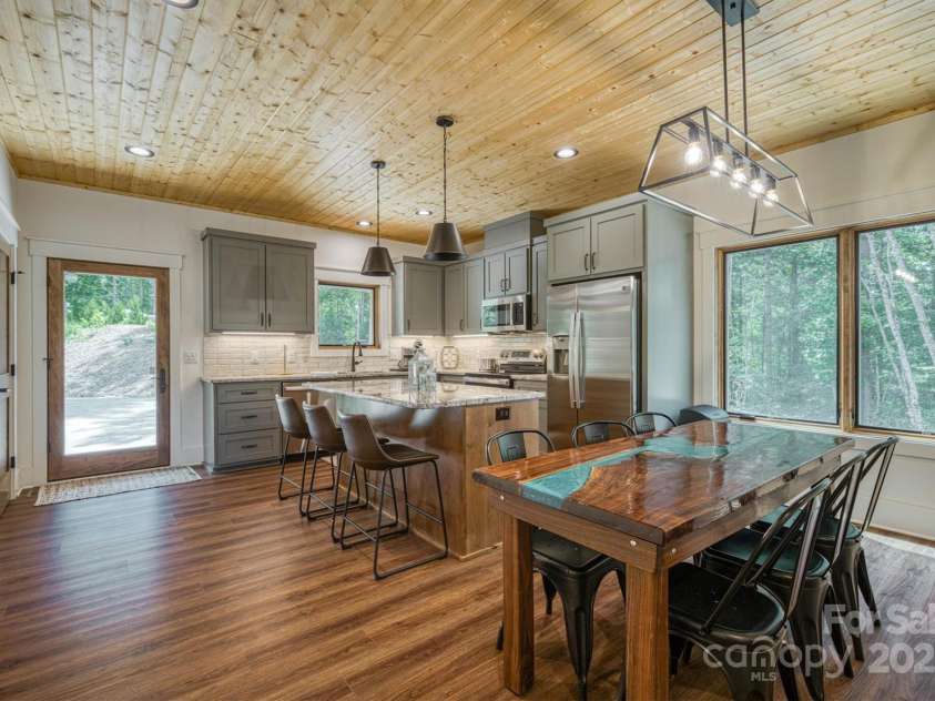 1370 Saylor Way, Nebo, NC 28761.  MLS# CAR4300345, YatesRealty ID 5924. Dining Area & Kitchen