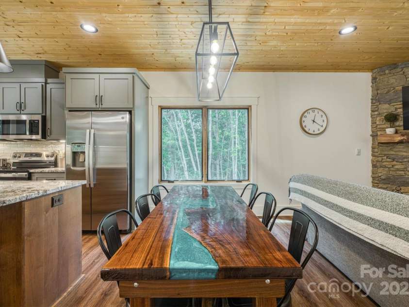 1370 Saylor Way, Nebo, NC 28761.  MLS# CAR4300345, YatesRealty ID 5924. Dining Area & Kitchen