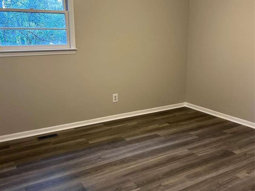 526 Kings Road, Shelby, NC 28150.  MLS# CAR4193837, YatesRealty ID 5924. Bedroom 2 with new flooring and ceiling fan