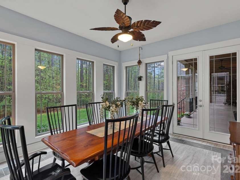 4637 Gold Finch Drive, Denver, NC 28037.  MLS# CAR4243866, YatesRealty ID 5930. French doors off of the sunroom that lead out onto the expansive back porch.