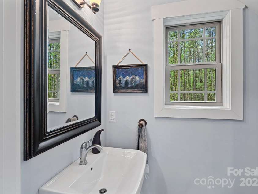 4637 Gold Finch Drive, Denver, NC 28037.  MLS# CAR4243866, YatesRealty ID 5930. Half bathroom in the carriage house.