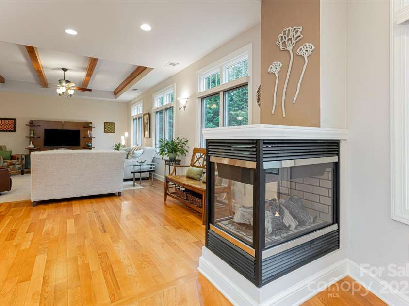 42 Pine Acre Boulevard, Asheville, NC 28804.  MLS# CAR4223859, YatesRealty ID 5932. Sunroom looking towards living room