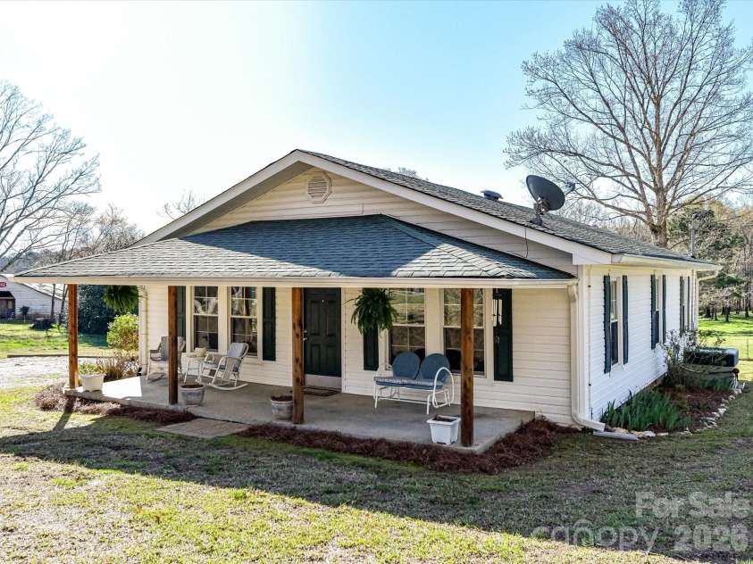6590 Camp Creek Road, Lancaster, SC 29720.  MLS# CAR4359392, YatesRealty ID 5933. Rocking Chair Front Porch