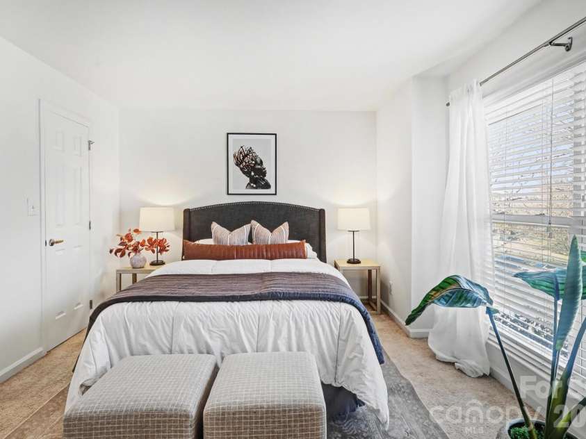 525 Graham Street, Charlotte, NC 28202.  MLS# CAR4341824, YatesRealty ID 5934. Serene bedroom retreat within an efficiently designed Uptown condo.