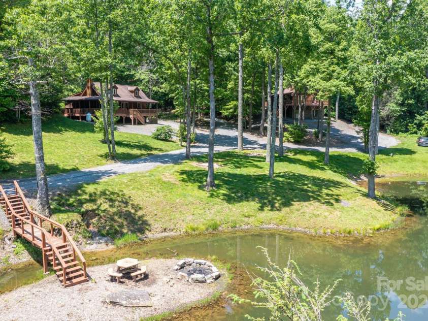 26 Upper Ridge Road, Black Mountain, NC 28711.  MLS# CAR4274378, YatesRealty ID 594. Entertainment space at the pond
