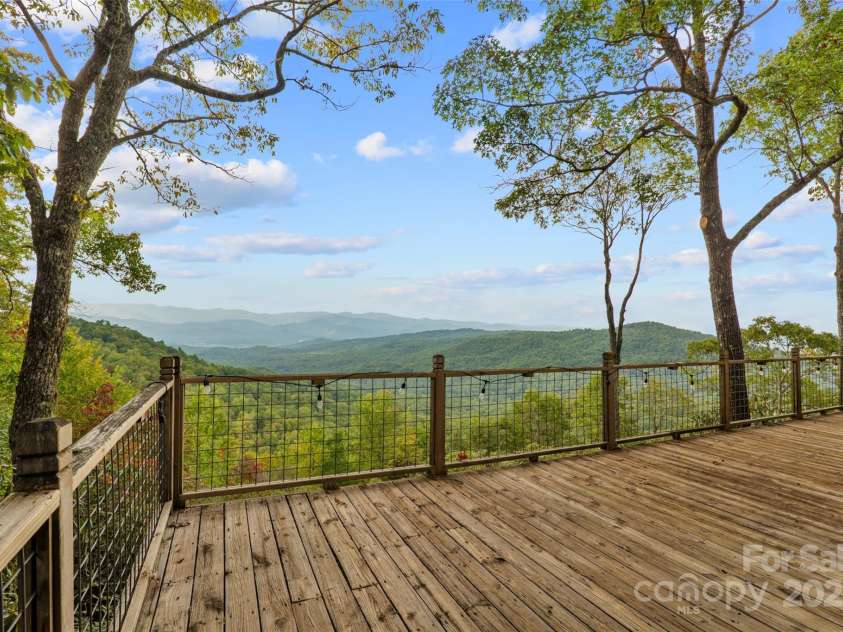 243 Ridgeline Drive, Brevard, NC 28712.  MLS# CAR4313542, YatesRealty ID 5944. Guest Cottage Deck