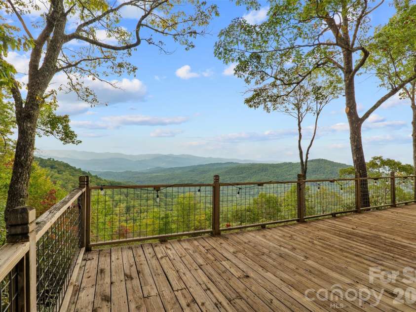 243 Ridgeline Drive, Brevard, NC 28712.  MLS# CAR4313542, YatesRealty ID 5944. Guest Cottage Deck