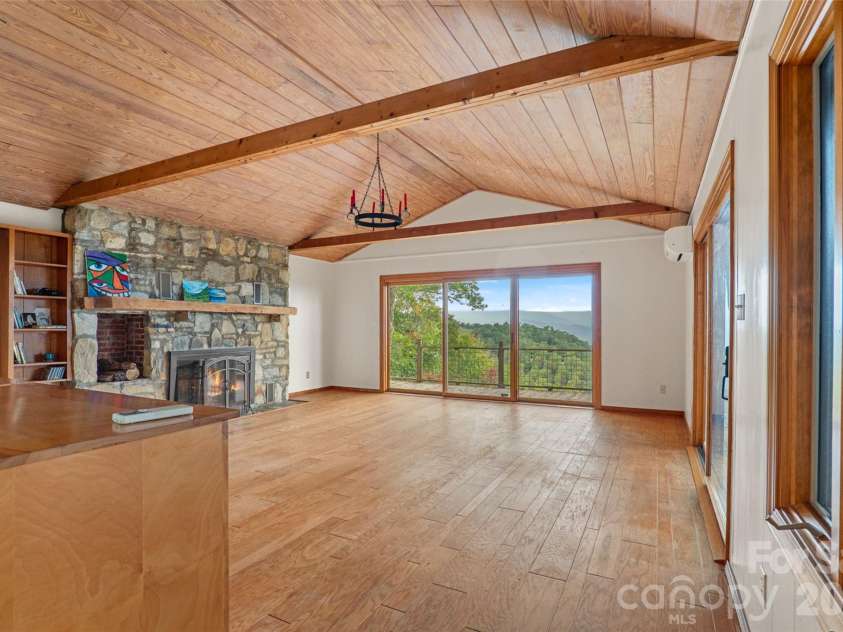 243 Ridgeline Drive, Brevard, NC 28712.  MLS# CAR4313542, YatesRealty ID 5944. Guest Cottage Living Room