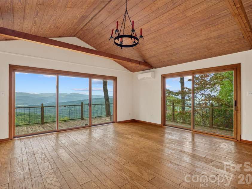 243 Ridgeline Drive, Brevard, NC 28712.  MLS# CAR4313542, YatesRealty ID 5944. Guest Cottage Living Room