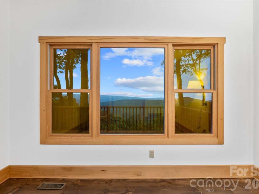 243 Ridgeline Drive, Brevard, NC 28712.  MLS# CAR4313542, YatesRealty ID 5944. Main House Bedroom