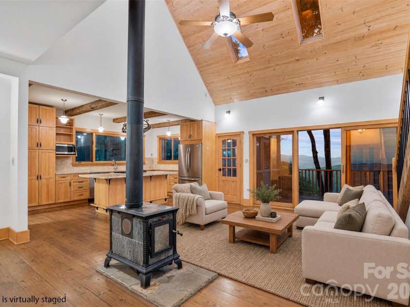 243 Ridgeline Drive, Brevard, NC 28712.  MLS# CAR4313542, YatesRealty ID 5944. Main House Living Room - Virtually Staged