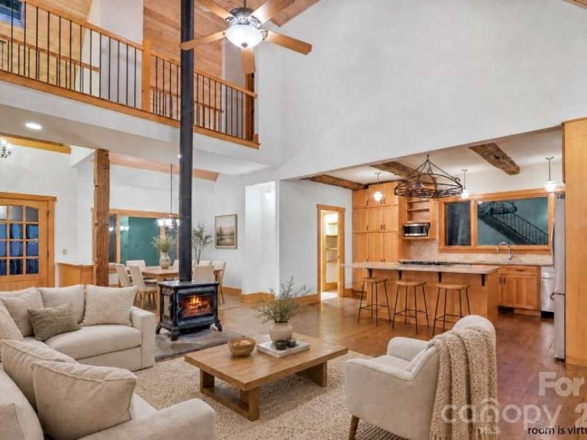 243 Ridgeline Drive, Brevard, NC 28712.  MLS# CAR4313542, YatesRealty ID 5944. Main House Living Room - Virtually Staged