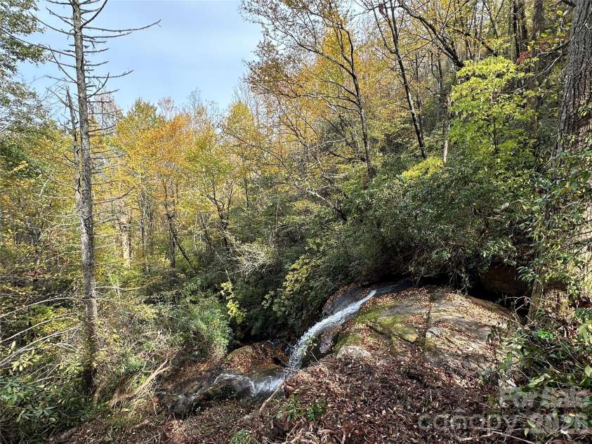 243 Ridgeline Drive, Brevard, NC 28712.  MLS# CAR4313542, YatesRealty ID 5944. Trail at Top of Upper Falls