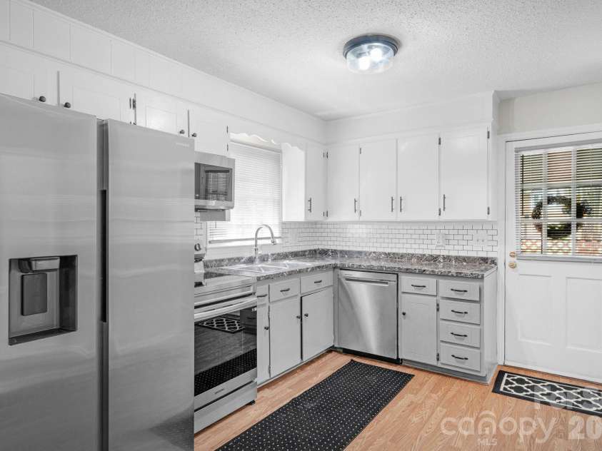 708 John Street, Matthews, NC 28105.  MLS# CAR4353646, YatesRealty ID 5948. 