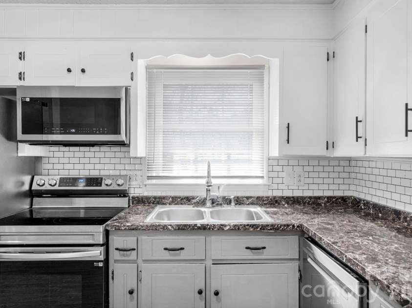 708 John Street, Matthews, NC 28105.  MLS# CAR4353646, YatesRealty ID 5948. 