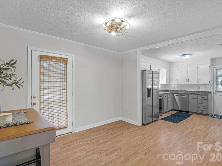 708 John Street, Matthews, NC 28105.  MLS# CAR4353646, YatesRealty ID 5948. 