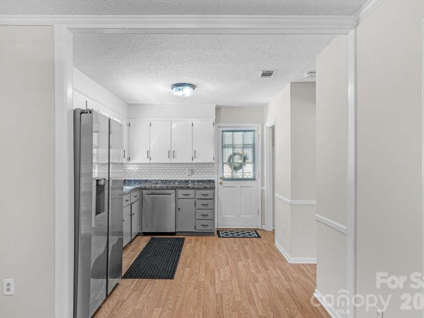 708 John Street, Matthews, NC 28105.  MLS# CAR4353646, YatesRealty ID 5948. 