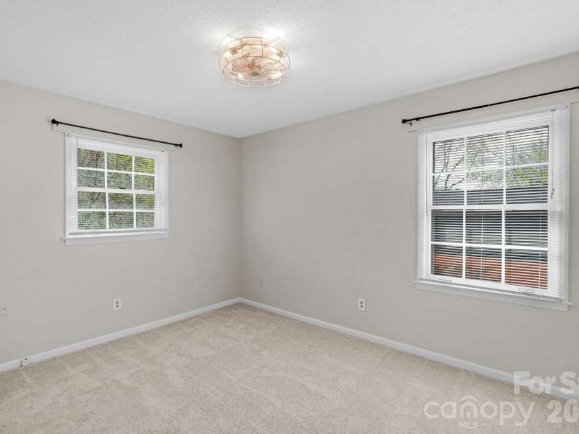 708 John Street, Matthews, NC 28105.  MLS# CAR4353646, YatesRealty ID 5948. 