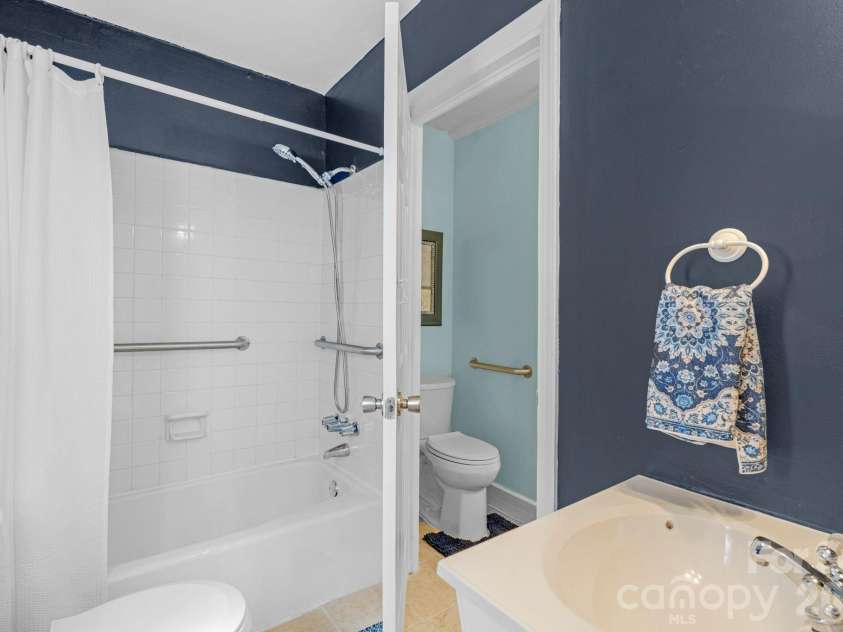 708 John Street, Matthews, NC 28105.  MLS# CAR4353646, YatesRealty ID 5948. 