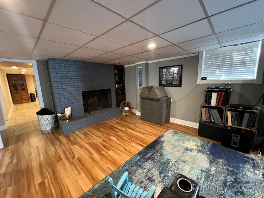 901 Ridge Street, Albemarle, NC 28001.  MLS# CAR4247010, YatesRealty ID 5950. Den - Rec Room Fireplace