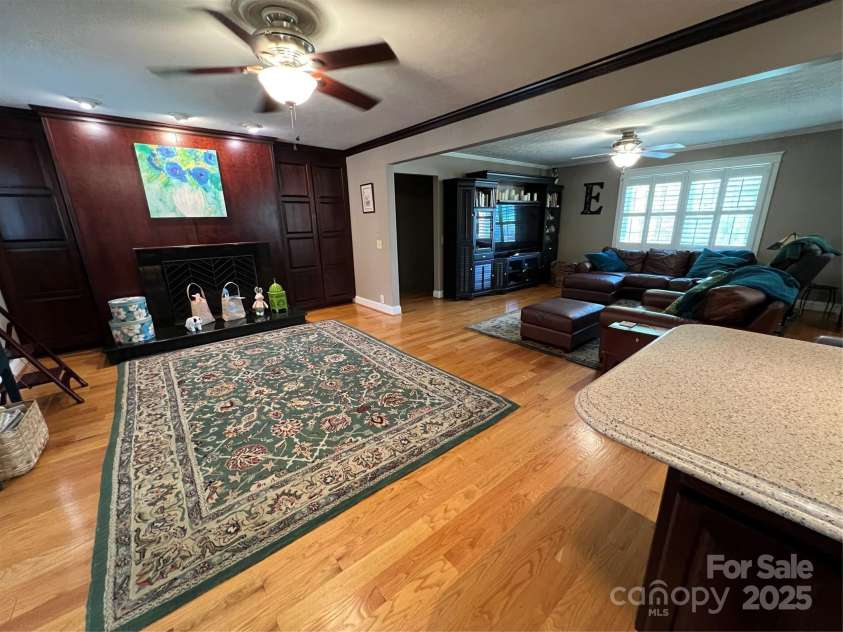 901 Ridge Street, Albemarle, NC 28001.  MLS# CAR4247010, YatesRealty ID 5950. Keeping room with Fireplace - a space to gather and talk/relax while kitchen prep occurs