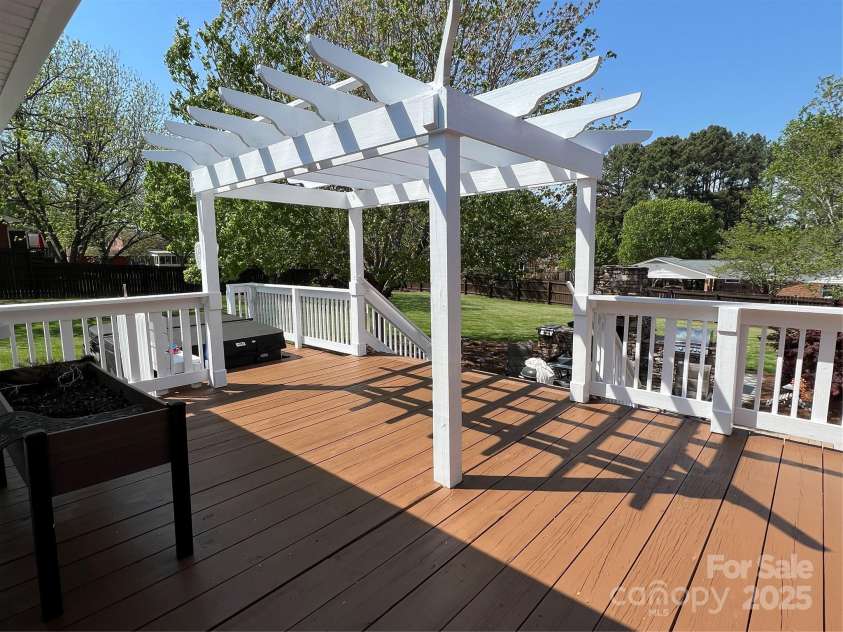 901 Ridge Street, Albemarle, NC 28001.  MLS# CAR4247010, YatesRealty ID 5950. Rear Deck with pergola