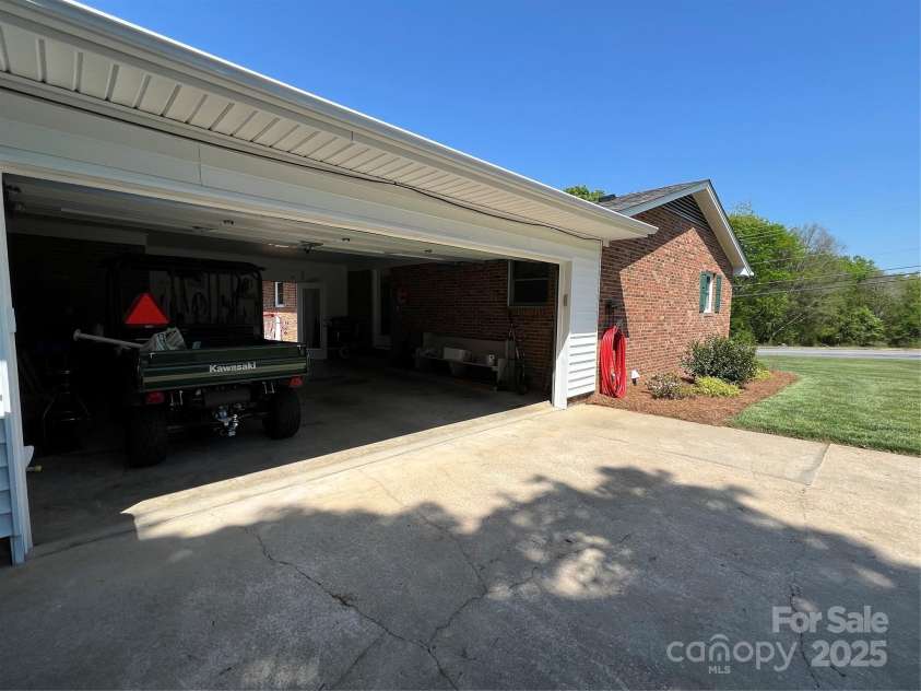 901 Ridge Street, Albemarle, NC 28001.  MLS# CAR4247010, YatesRealty ID 5950. Side load garage -