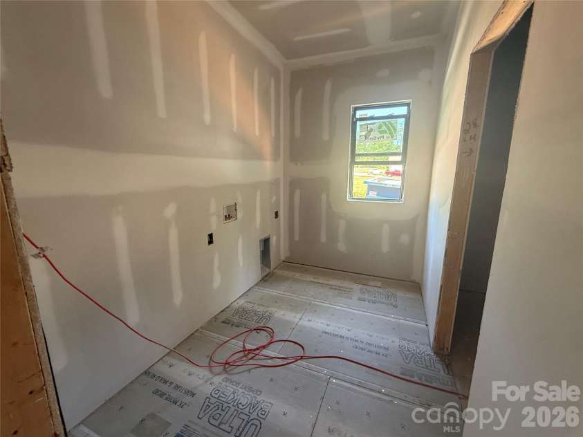219 Barra Drive, Waxhaw, NC 28173.  MLS# CAR4358638, YatesRealty ID 5953. Laundry room with cabinets and folding counter