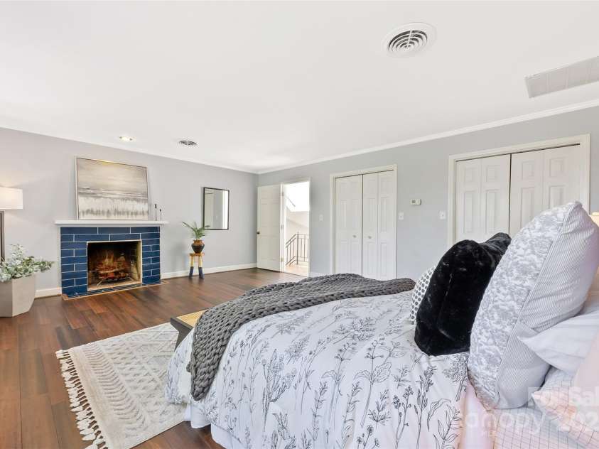 21 Hollyberry Woods, Lake Wylie, SC 29710.  MLS# CAR4241992, YatesRealty ID 5963. Charming fireplace and lots of storage options in the primary suite.