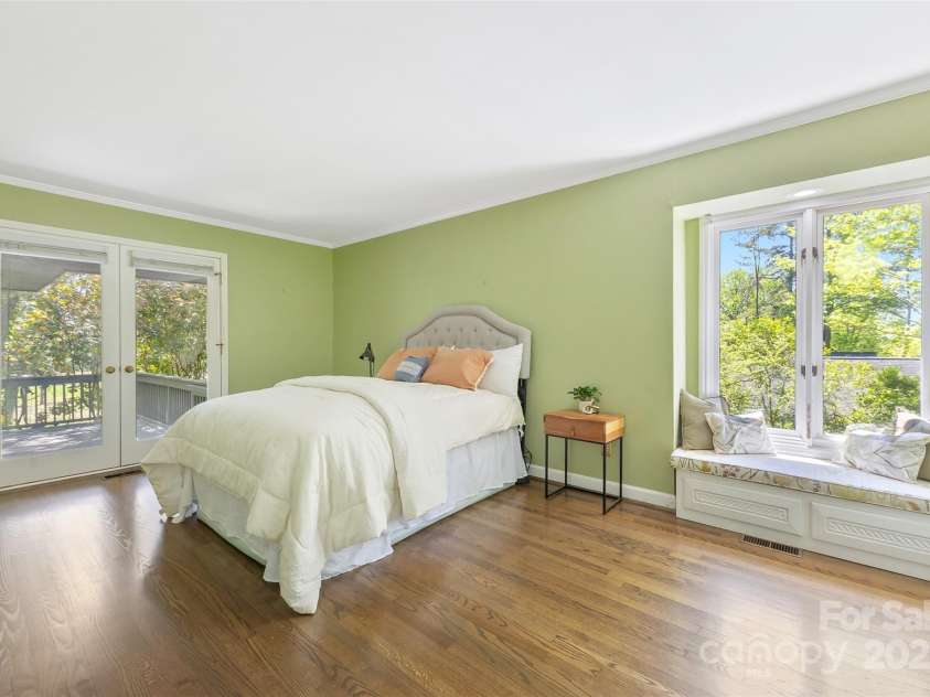 21 Hollyberry Woods, Lake Wylie, SC 29710.  MLS# CAR4241992, YatesRealty ID 5963. Hardwoods in this secondary bedroom with walk in closet and leads to deck.