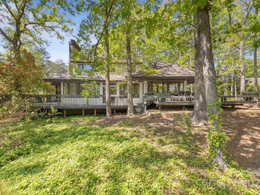 21 Hollyberry Woods, Lake Wylie, SC 29710.  MLS# CAR4241992, YatesRealty ID 5963. Simply gorgeous home nestled in the trees.