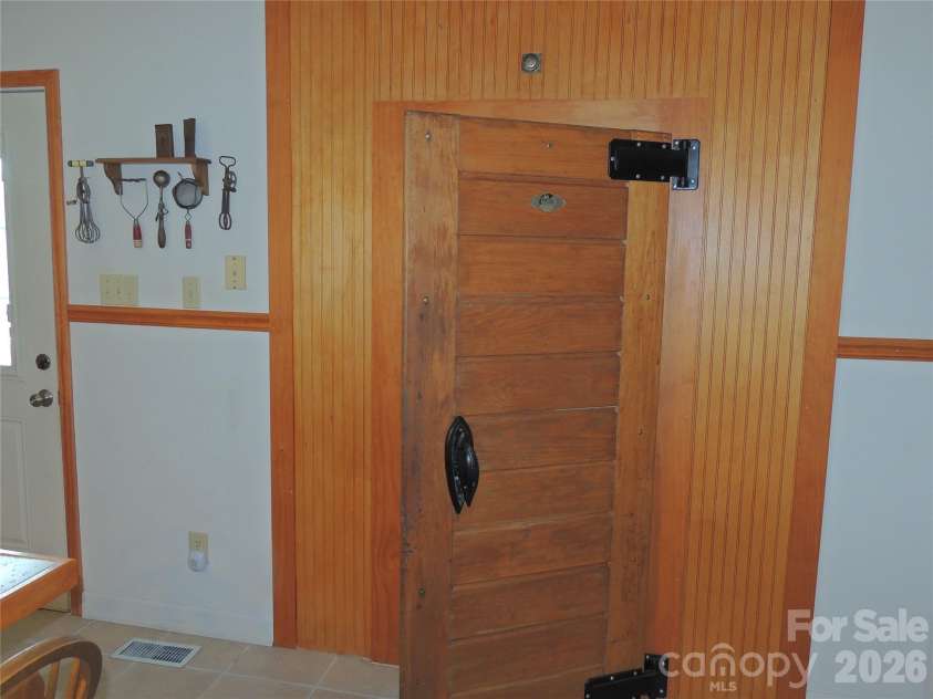 256 Gable Hill Lane, Bostic, NC 28018.  MLS# CAR4342092, YatesRealty ID 5963. Vintage Locker Door to Laundry/Pantry