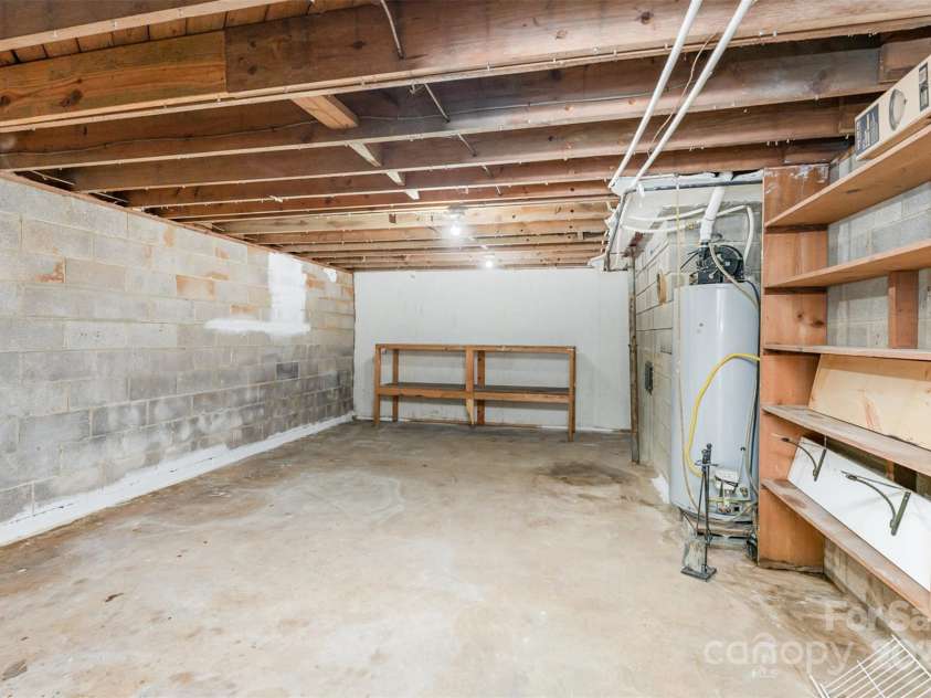 401 Dakota Street, Kannapolis, NC 28083.  MLS# CAR4234631, YatesRealty ID 5968. Workshop in basement