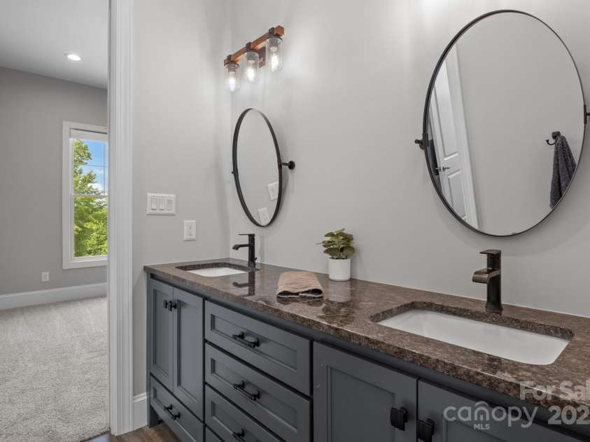 5360 Low Country Road, Lenoir, NC 28645.  MLS# CAR4252044, YatesRealty ID 597. 2nd full bathroom which adjoins bedrooms 2 and 3