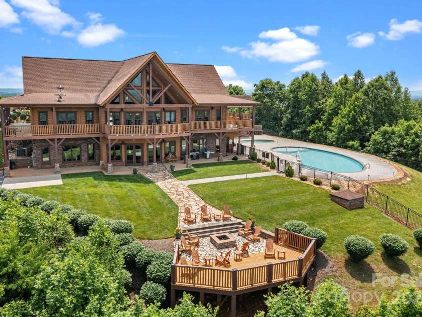 5360 Low Country Road, Lenoir, NC 28645.  MLS# CAR4252044, YatesRealty ID 597. Community Lodge showing pool and firepit