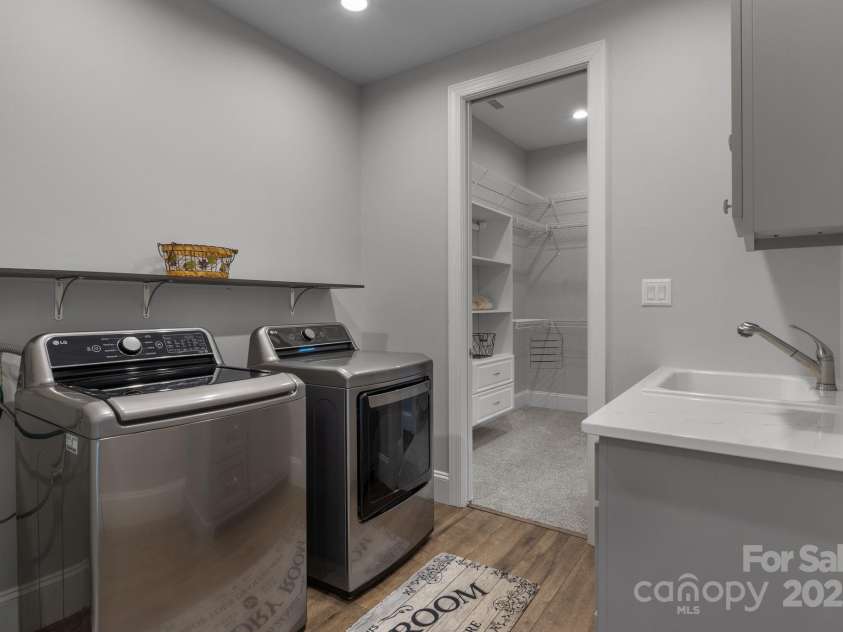 5360 Low Country Road, Lenoir, NC 28645.  MLS# CAR4252044, YatesRealty ID 597. Laundry Room with access from primary closet and/or hallway