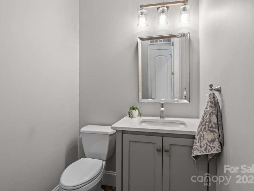 5360 Low Country Road, Lenoir, NC 28645.  MLS# CAR4252044, YatesRealty ID 597. Main level half bath