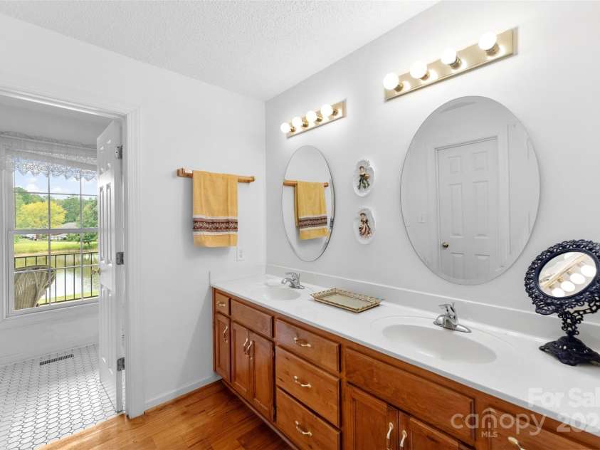 908 Ramseur Road, Bessemer City, NC 28016.  MLS# CAR4299106, YatesRealty ID 597. Primary bath 