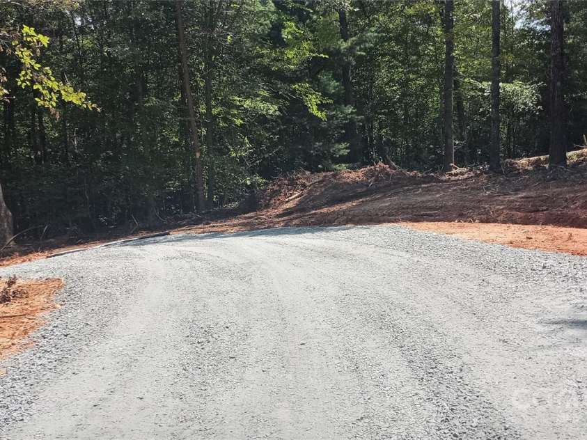 1414 Biggerstaff Loop, Nebo, NC 28761.  MLS# CAR4177801, YatesRealty ID 599. New road  under construction