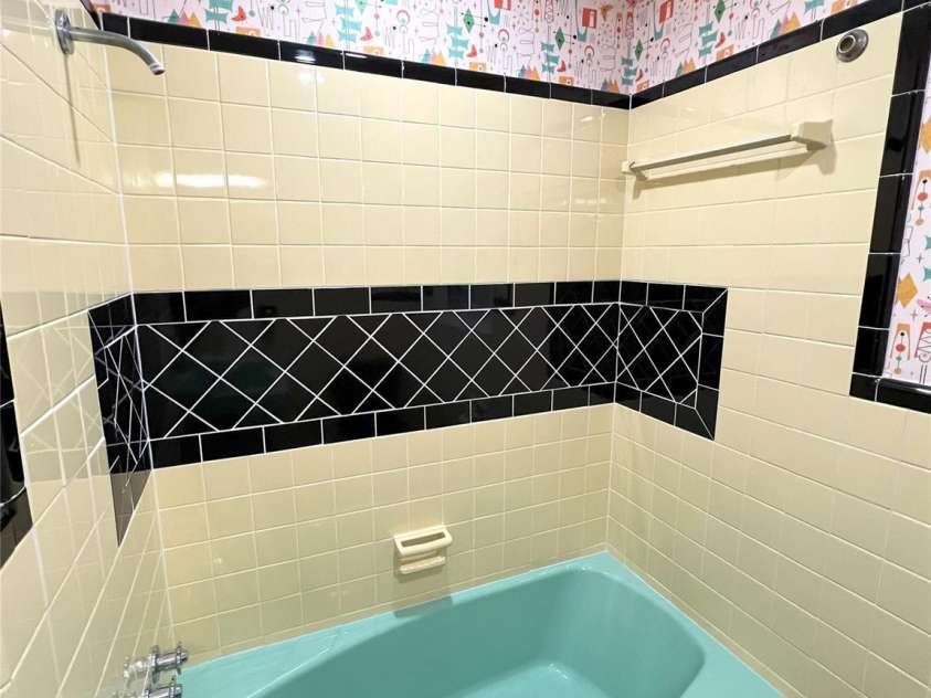 612 Brown Avenue, Albemarle, NC 28001.  MLS# CAR4119824, YatesRealty ID 5995. Hall Bathroom - vintage restored tile/tub