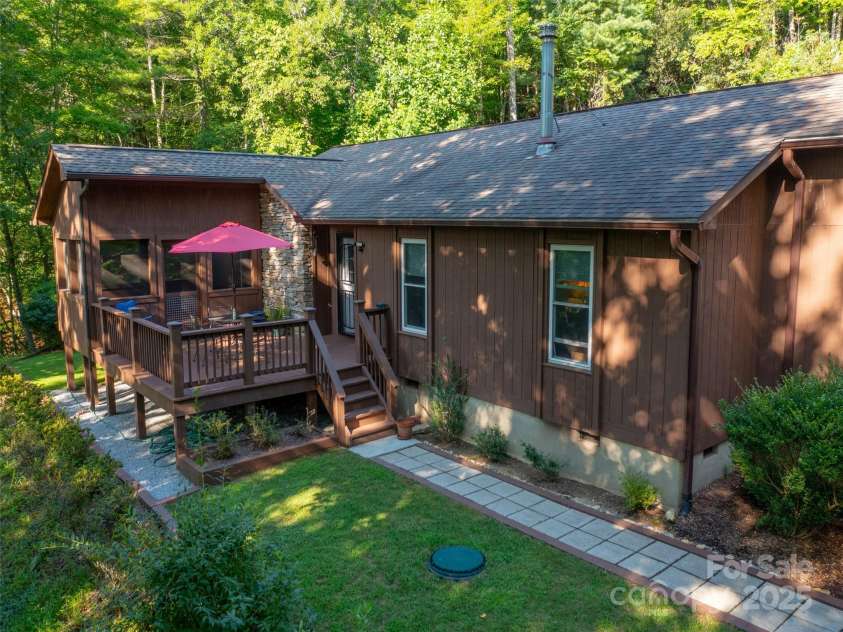 173 Cherokee Springs Trail, Hendersonville, NC 28739.  MLS# CAR4233123, YatesRealty ID 5997. Enjoy the outdoors from the deck or screened porch