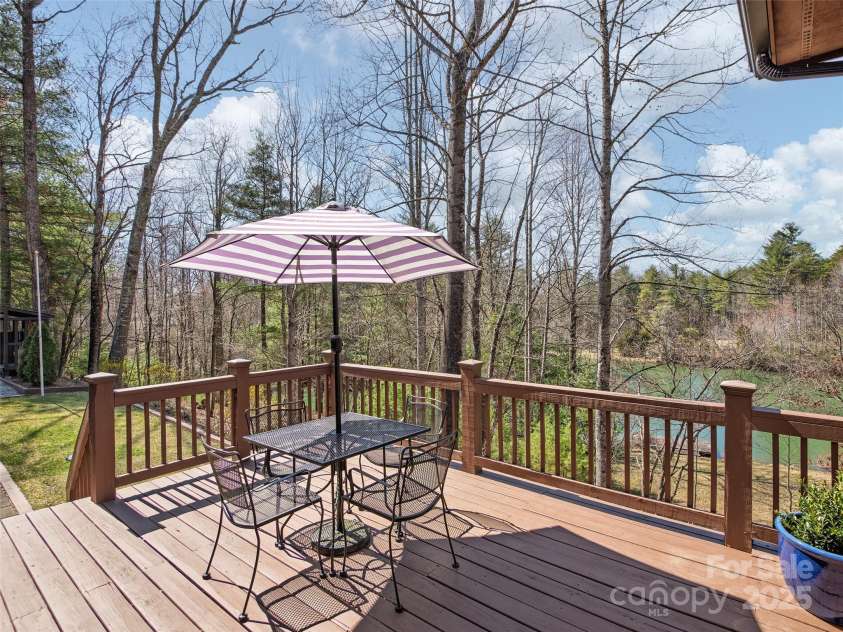 173 Cherokee Springs Trail, Hendersonville, NC 28739.  MLS# CAR4233123, YatesRealty ID 5997. Enjoy the peaceful pond view from your deck!