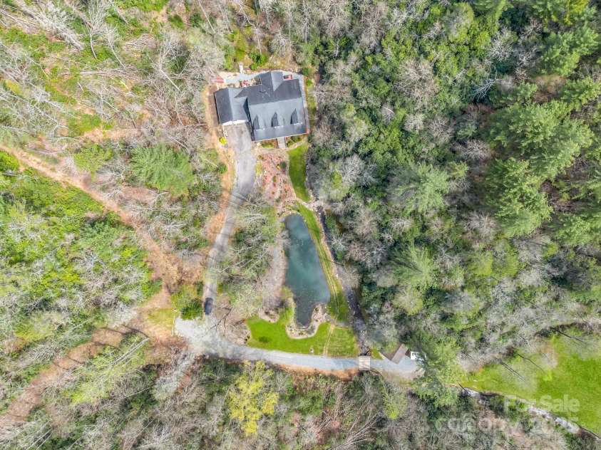 560 Charleys Knob Road, Pisgah Forest, NC 28768.  MLS# CAR4246535, YatesRealty ID 6002. 12.8 acres