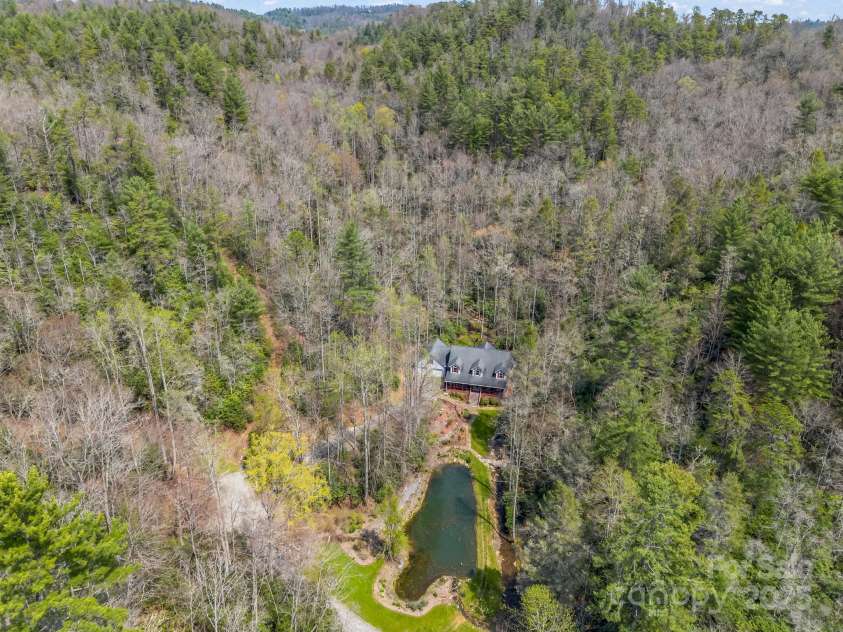 560 Charleys Knob Road, Pisgah Forest, NC 28768.  MLS# CAR4246535, YatesRealty ID 6002. 12.8 private acres